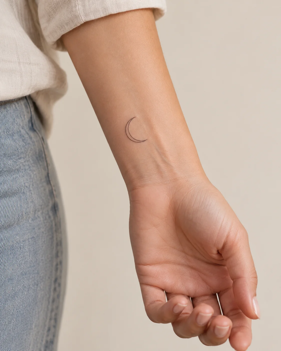 Fine Crescent fine line tattoo concept on the inner wrist